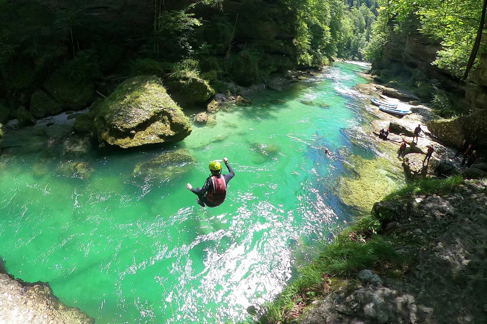 Clear alpine river showing visible current patterns and eddies